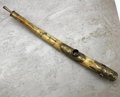 Dragon's Embrace Bone Pipe: Dragon&#39;s Embrace Bone Pipe  This exquisite bone pipe combines artistry and craftsmanship, featuring intricate carvings of landscapes, floral motifs, and human figures that wrap around its surface.