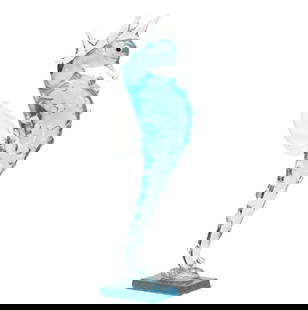 Lovely Blue Seahorse Murano Glass Sculpture: Lovely Blue Seahorse Murano Glass Sculpture  Introduce a touch of aquatic elegance to your decor with our Lovely Blue Seahorse Murano Glass Sculpture. Handcrafted by skilled artisans in the esteemed M
