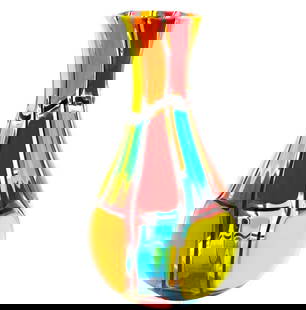 Multicolor Puzzle Vase – Murano Glass: Multicolor Puzzle Vase – Murano Glass This Venetian glass centerpiece vase is handcrafted using the glass-blowing technique, featuring multicolored glass spots and mosaic detailing. Signed by the gl