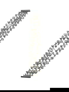 Natural White Baroque 4-Strand Freshwater Pearl Bracelet: Natural White Baroque 4-Strand Freshwater Pearl Bracelet. Natural Silver Glimmers Come Off Each Of The 7-8mm Pearls. There are 60+ Pearls On This 4 Strand Bracelet and Is Accompanied By A Push Tu
