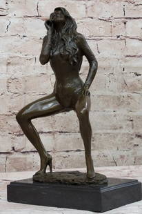Bold Seduction Bronze Sculpture- 12" x 7": Bold Seduction Bronze Sculpture- 12" x 7" This is an original, inspired by and bearing the signature of artist Milo. Cast in bronze with striking detail, this sculpture portrays a