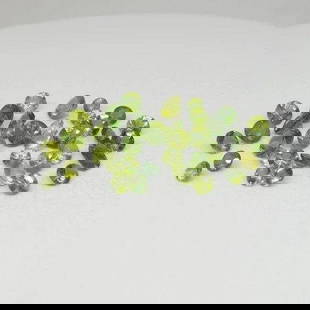 0.24ct Brilliant Cut Green Sapphire: Description: Gem Type: Sapphire Number of Stones: 1 Shape: Round Cutting Style Crown: Brilliant Cut Cutting Style Pavilion: Step Cut Transparency: Transparent Clarity: Very