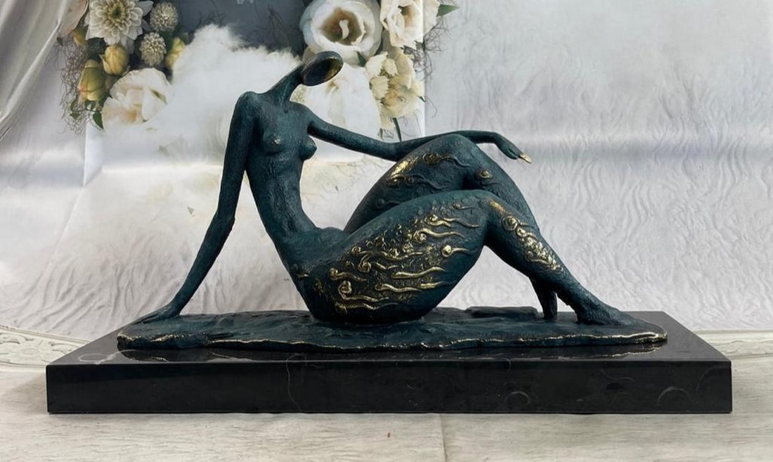Mesmerizing Modern Abstract Woman Bronze Sculpture: Mesmerizing Modern Abstract Woman Bronze Sculpture An abstract female dancer sculpture. You can just tell this is a powerful dancer in the sharpness of her position. This wonderfully curvaceous woman