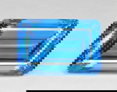 61.6ct Octagon Step Cut Swiss Blue Topaz: 61.6ct Octagon Step Cut Swiss Blue Topaz Type: Topaz Weight:61.60 ct Size:25 X 18 mm Shape: Octagon Step Cut Color: Swiss Blue Clarity: IF Treatment: Irradi