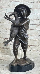 Little Boy Holding Lamb Original Bronze Statue - 15" x 7": Little Boy Holding Lamb Original Bronze Statue - 15&#34; x 7&#34;   Embrace the rustic charm of the Young Farm Boy &amp; His Sheep bronze statue, a timeless tribute to rural life and innocence. Meticu