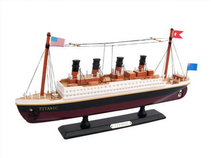 Wooden RMS Titanic Model Cruise Ship 14": Wooden RMS Titanic Model Cruise Ship 14&#34;  This adorable model cruise ship is inspired by history’s most famous ocean liner, the RMS Titanic. Ideally sized to rest upon any shelf or desk, this fu
