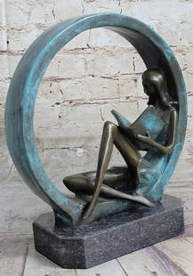 Peaceful Reading Woman Bronze Sculpture: Peaceful Reading Woman Bronze Sculpture   The &#34;Girl Reading a Book&#34; sculpture is a sweet representation of childlike innocence. Perfect as a tabletop piece and at 9 inches is