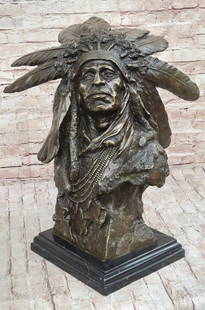 Kauba Native American Indian Chief Bust Inspired Bronze Sculpture - 21" x 19.5": Kauba Native American Indian Chief Bust Inspired Bronze Sculpture - 21&#34; x 19.5&#34;  Honor the noble spirit of the Native American heritage with the Carl Kauba Native American Indian Chief Bust, a