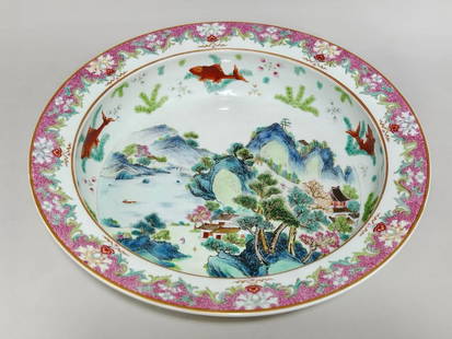 Famille Rose Plate with Auspicious Fish and Mountain Village Landscape Design: Famille Rose Plate with Auspicious Fish and Mountain Village Landscape Design  This finely enameled famille rose porcelain plate presents a unique and harmonious composition blending nature and symbol