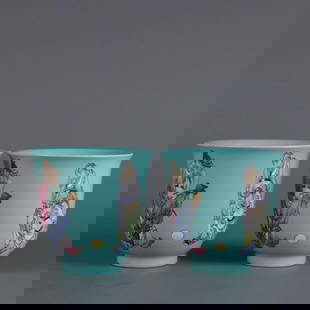 Pair of Qing Yongzheng Famille Rose Cups with Football Scene: Pair of Qing Yongzheng Famille Rose Cups with Football Scene  This exquisite pair of famille rose porcelain cups from the Yongzheng period of the Qing Dynasty features a vibrant green ground and a fin