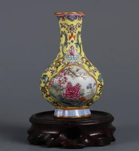 Qing Qianlong Yellow Ground Famille Rose Begonia-Shaped Vase: Qing Qianlong Yellow Ground Famille Rose Begonia-Shaped Vase  his magnificent famille rose vase from the Qianlong period of the Qing Dynasty features a striking yellow ground adorned with open medalli