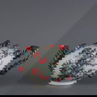 Qing Qianlong Famille Rose Teapot with Longevity Peaches: Qing Qianlong Famille Rose Teapot with Longevity Peaches  This exquisite teapot from the Qianlong period of the Qing Dynasty is adorned with vibrant famille rose enamels, featuring auspicious longevit