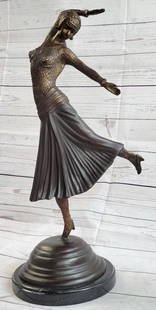 The Russian Dancer Bronze Statue - 22" x 12": The Russian Dancer Bronze Statue - 22&#34; x 12&#34;     This enchanting bronze sculpture vividly embodies the art of dance, encapsulating the qualities of grace, agility, and flexibility personified