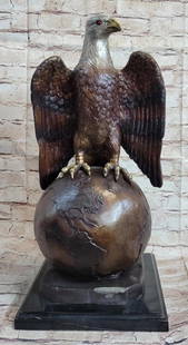 Moigniez Inspired Eagle Perched On Globe Bronze Sculpture - 22" x 11": Moigniez Inspired Eagle Perched On Globe Bronze Sculpture - 22&#34; x 11&#34;  This striking bronze sculpture portrays a majestic eagle in a captivating pose, firmly gripping our planet Earth with its