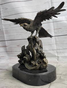 Original Eagle Landing on Waves Bronze Sculpture - 13" x 13": Original Eagle Landing on Waves Bronze Sculpture - 13&#34; x 13&#34;  This bronze sculpture depicts a bird with its wings open, standing on a fluid-like bronze plinth. The bird appears to be absorbing