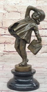 Little Scholar Reproduction Bronze Sculpture - 9" x 5": Little Scholar Reproduction Bronze Sculpture - 9&#34; x 5&#34;.  Inspired by and bearing the signature of artist Chiparus, this heartwarming bronze reproduction sculpture captures the innocence and de