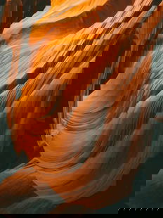Stone and Light: Stone and Light  Waves of sculpted sandstone twist and rise within Antelope Canyon, carved by wind and water into flowing forms. Shafts of sunlight pierce the narrow passageways, illuminating rich ton