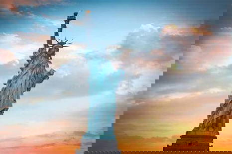 Liberty at Dusk: A Sky Painted in Freedom: Liberty at Dusk: A Sky Painted in Freedom  The Statue of Liberty stands tall and proud, silhouetted against a breathtaking sky awash with hues of blue, orange, pink, and purple. The clouds stretch wid