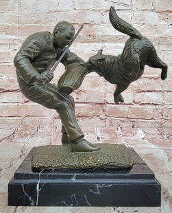 Police Dog Trainer Original Bronze Statue - 9.5" x 8.5": Police Dog Trainer Original Bronze Statue - 9.5&#34; x 8.5&#34;   This heartfelt bronze sculpture by artist Milo beautifully captures the bond between a dog and its trainer. The trainer leans in with