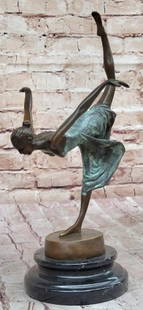 Bronze Dancer Girl Sculpture with Green Patina Dress: Bronze Dancer Girl Sculpture with Green Patina Dress  Graceful and dynamic, this hot cast bronze sculpture captures a dancer in mid-performance, balancing delicately on one leg with the other extended