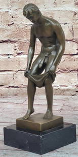Bronze Sculpture Capturing the Allure of the Male Form: Bronze Sculpture Capturing the Allure of the Male Form In this bold and expressive bronze sculpture, the artist skillfully captures the essence of a striking and athletic male figure, evoking the aura