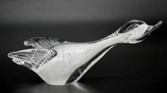 Murano Glass Duck in Flight: Murano Glass Duck in Flight  Graceful and dynamic, this Murano glass flying duck captures the essence of movement in mid-flight. Hand-blown by skilled artisans, the figurine features fluid lines and r