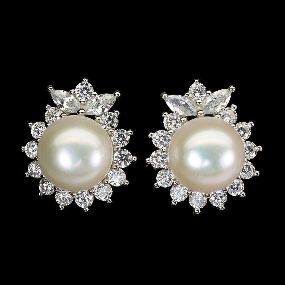 Timeless Pearl 10mm Stud Earrings: Timeless Pearl 10mm Stud Earrings Embrace the epitome of timeless elegance with our classic pearl stud earrings. Featuring perfectly round, lustrous pearls, these earrings exude a sense of sophisticat