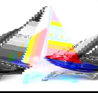Mulitcolor Murano Glass Sailboat: Mulitcolor Murano Glass Sailboat  Exclusive and unique glass artwork of sail boat handmade in colored glass realized with fusing glass technique. The sculpture is perfect to be used as a paperweight t