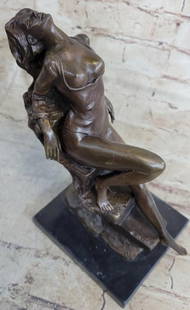 Signed Original Sensual Woman Bronze Sculpture - 9" x 10": Signed Original Sensual Woman Bronze Sculpture - 9&#34; x 10&#34;  She is an artist&#39;s muse. She poses for a painting, sitting on the edge of a rock.She is wearing a negligee is draped over the sid