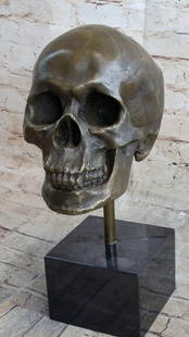 Skeleton Head Bust Bronze Sculpture - 14" x 7": Skeleton Head Bust Bronze Sculpture - 14" x 7" This is the creepiest yet most interesting at the same time sculpture. For the people that love Halloween or simply find weird and unique
