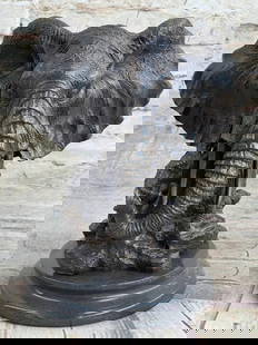 Majestic Elephant Bronze Sculpture with Baby and Expansive Ears - 8" x 8": Majestic Elephant Bronze Sculpture with Baby and Expansive Ears - 8" x 8" Embrace the grandeur of the natural world with this striking bronze sculpture, which masterfully captures the