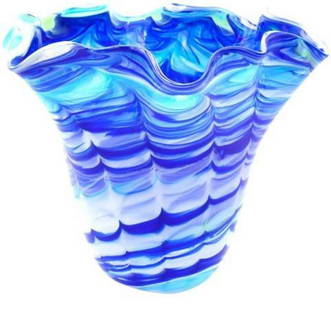 Waves of Blue Murano Glass Centerpiece: Waves of Blue Murano Glass Centerpiece  Elevate your space with this centerpiece in mesmerizing shades of blue, handcrafted from authentic Murano glass. Inspired by the movement of ocean waves, this s
