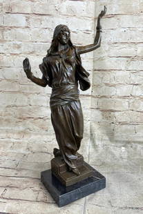 Arabian Dancer Inspired Bronze Statue - 16.5" x 9": Arabian Dancer Inspired Bronze Statue - 16.5&#34; x 9&#34;  This bronze sculpture portrays an Arabian woman in a graceful dance, fully immersed in the music from a nearby radio. Her flowing dress and