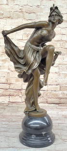 Women Flapper Dancer Inspired Bronze Statue - 20.5" x 9.5": Women Flapper Dancer Inspired Bronze Statue - 20.5&#34; x 9.5&#34;  This captivating bronze statue embodies the Art Nouveau style, showcasing fluid lines and intricate details. Depicting a lively Gyps