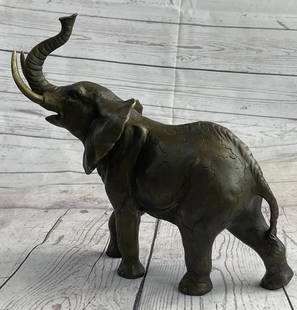 Elephant Bronze Sculpture: Elephant Bronze Sculpture  Many don&#96;t consider the elephant for its beauty and grace but rather its size and funny trunk, but there is something to love about this large creature besides Walt Disn