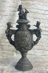 Signed Original Neoclassical Cherubim Bronze Urn Sculpture On Marble Base - 20" x 12": Signed Original Neoclassical Cherubim Bronze Urn Sculpture - 20&#34; x 12&#34;  Now here is a piece that makes a statement. It says class. It says elegance. It says beauty. This is a decorative bronze