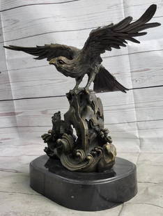 Original Eagle Landing on Waves Bronze Sculpture - 13" x 13": Original Eagle Landing on Waves Bronze Sculpture - 13" x 13" This bronze sculpture depicts a bird with its wings open, standing on a fluid-like bronze plinth. The bird appears to be