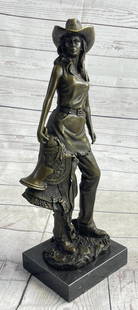Western Cowgirl Bronze Sculpture - 15" x 6": Western Cowgirl Bronze Sculpture - 15" x 6" Standing tall and proud, this western rose proves that the range isn`t just for the boys! Expertly cast in real bronze, this lasso wielding