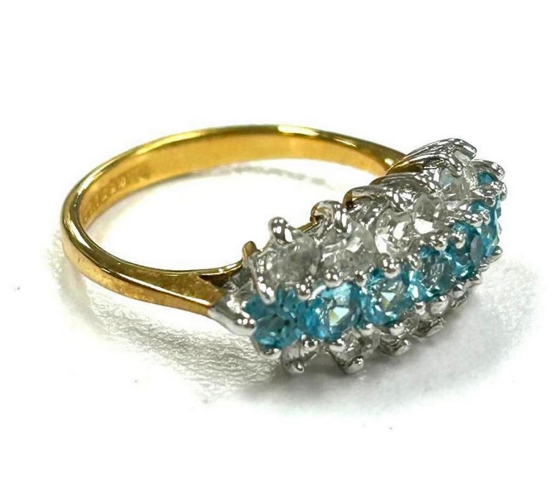 Sky Blue & White Swarovski Crystals Lined Ring Size 6: Sky Blue & White Swarovski Crystals Lined Ring Size 6 Adorned with enchanting sky blue and white Swarovski crystals, this ring is crafted to capture the essence of a clear blue sky. It sparkles wi