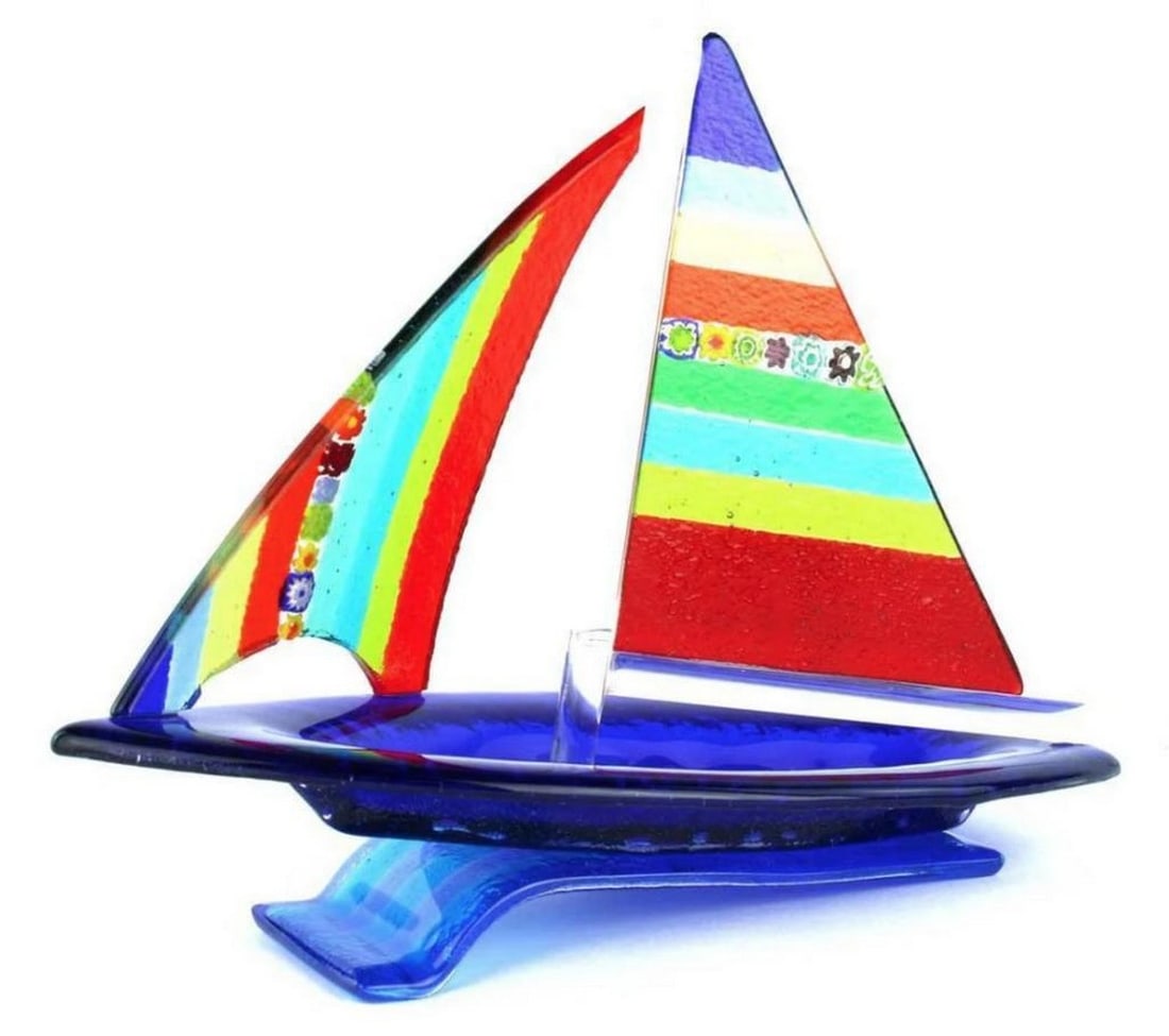 Mulitcolor Murano Glass Sailboat: Mulitcolor Murano Glass Sailboat Exclusive and unique glass artwork of sail boat handmade in colored glass realized with fusing glass technique. The sculpture is perfect to be used as a paperweight t