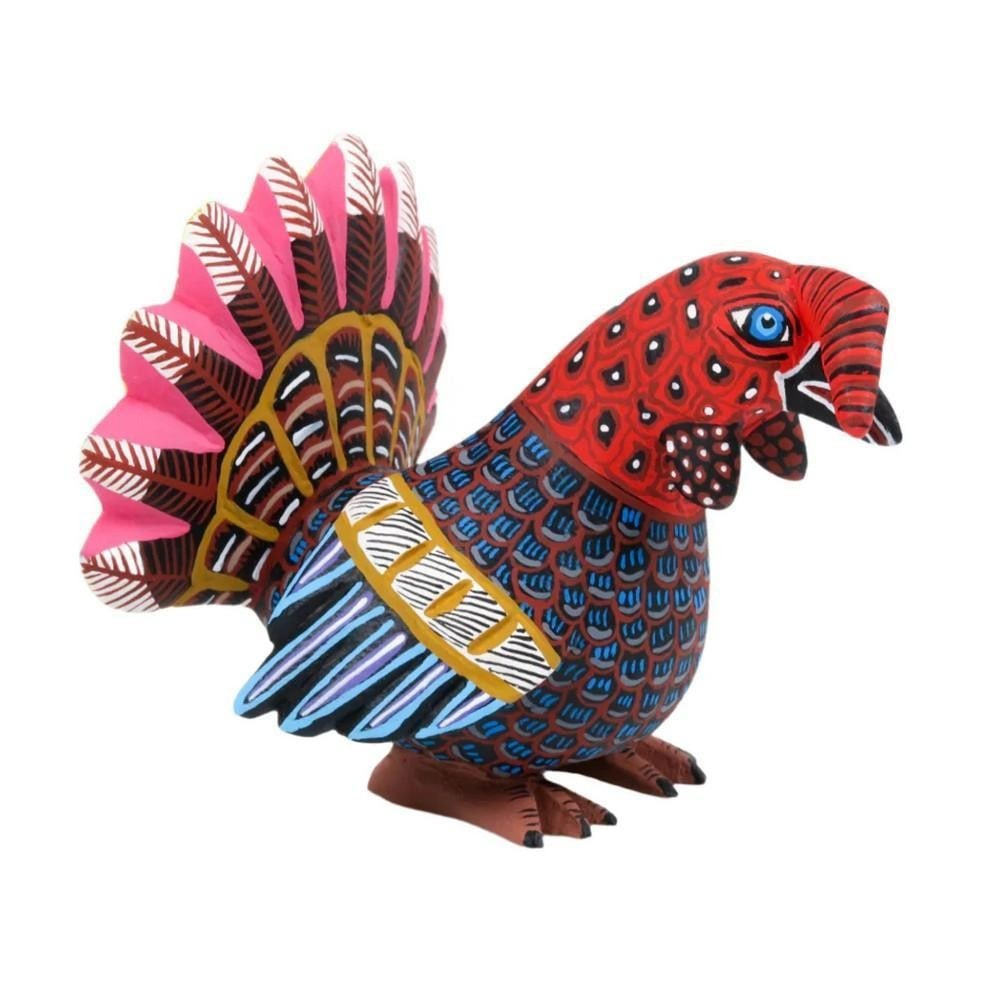 Whimsical Turkey Alebrije – Handcrafted Oaxacan Folk Art: Whimsical Turkey Alebrije – Handcrafted Oaxacan Folk Art Celebrate the vibrant spirit of Mexican craftsmanship with this unique turkey alebrije—masterfully carved from copal wood by the talented R