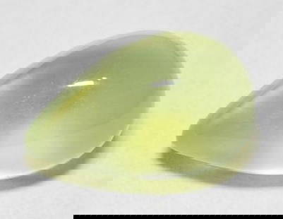 7.3ct Pear Cabochon Sour Lime Green Prehnite Gemstone: 7.3ct Pear Cabochon Sour Lime Green Prehnite Gemstone Introducing the refreshing elegance of our 7.3ct Pear Cabochon Sour Lime Green Prehnite Gemstone. Crafted to perfection, its smooth and polished