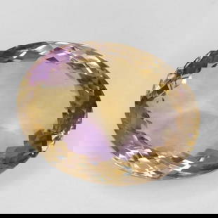 Natural and Rare Oval Bi-color Ametrine Gemstone: Natural and Rare Oval Bi-color Ametrine Gemstone  This is a natural and rare bi-color Ametrine in oval facet shape gemstone that measures at 21.65 x 16.57 x 9.93mm. The gemstone was mined in Brazil an
