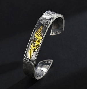 German Mark Silver Coin Bangle: German Mark Silver Coin Bangle  Crafted from authentic 1935–1939 German Mark coins, this handcrafted silver bangle preserves powerful history in a wearable form. Each piece is double-sided, showcasi