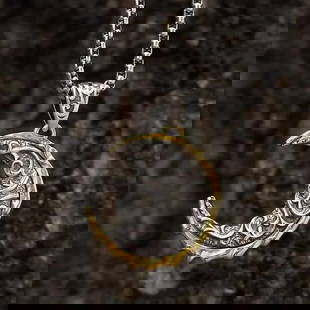 Crescent Moon Pendant: Crescent Moon Pendant  Handcrafted under the influence of Mongolia’s star-drenched skies, the Crescent Moon Pendant captures the gentle curve of the moon in a design full of quiet power and mystery.