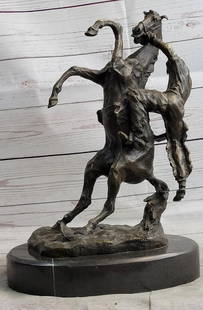 Cowboy Bucked off Horse Inspired Bronze Statue - 15" x 10": Cowboy Bucked off Horse Inspired Bronze Statue - 15&#34; x 10&#34;  This bronze statue vividly captures the thrilling moment of a cowboy being bucked off a horse. The horse is dramatically reared up o