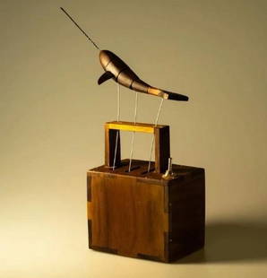 Song of the Sea: Handcrafted Walnut Wood Narwhal Musical Automaton: Song of the Sea: Handcrafted Walnut Wood Narwhal Musical Automaton Delightfully whimsical and finely crafted, this battery-powered wooden automaton features a charming narwhal figure brought to life