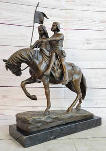 Bronze Figure of a Couple on Horseback - 18.5" x 14": Bronze Figure of a Couple on Horseback - 18.5&#34; x 14&#34;  This enchanting bronze figure captures the essence of romance and adventure, depicting a man and woman gracefully riding horseback while c