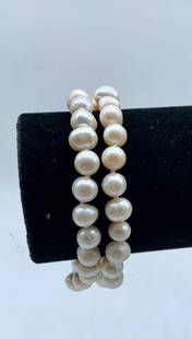 8" White 7mm-8mm Freshwater Double Strand Pearl Bracelet - 50 Pearls: 8&#34; White 7mm-8mm Freshwater Double Strand Pearl Bracelet - 50 Pearls. A Had Knotted Double Stranded Bracelet That Sports A Precious Circular Gold Tone Push Tab Clasp. An Excellent Add To Some Of T