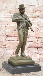 Soulful Serenade: Bronze Sculpture of a Black American Clarinetist: Soulful Serenade: Bronze Sculpture of a Black American Clarinetist This handmade bronze sculpture, Soulful Serenade, powerfully captures the deep emotional energy of a Black American musician immersed